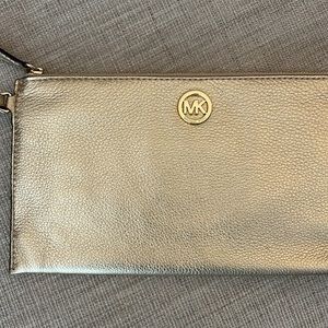 Brand New. Never Used. Michael Kors Pale Gold Pebbled Leather Wristlet Handbag.